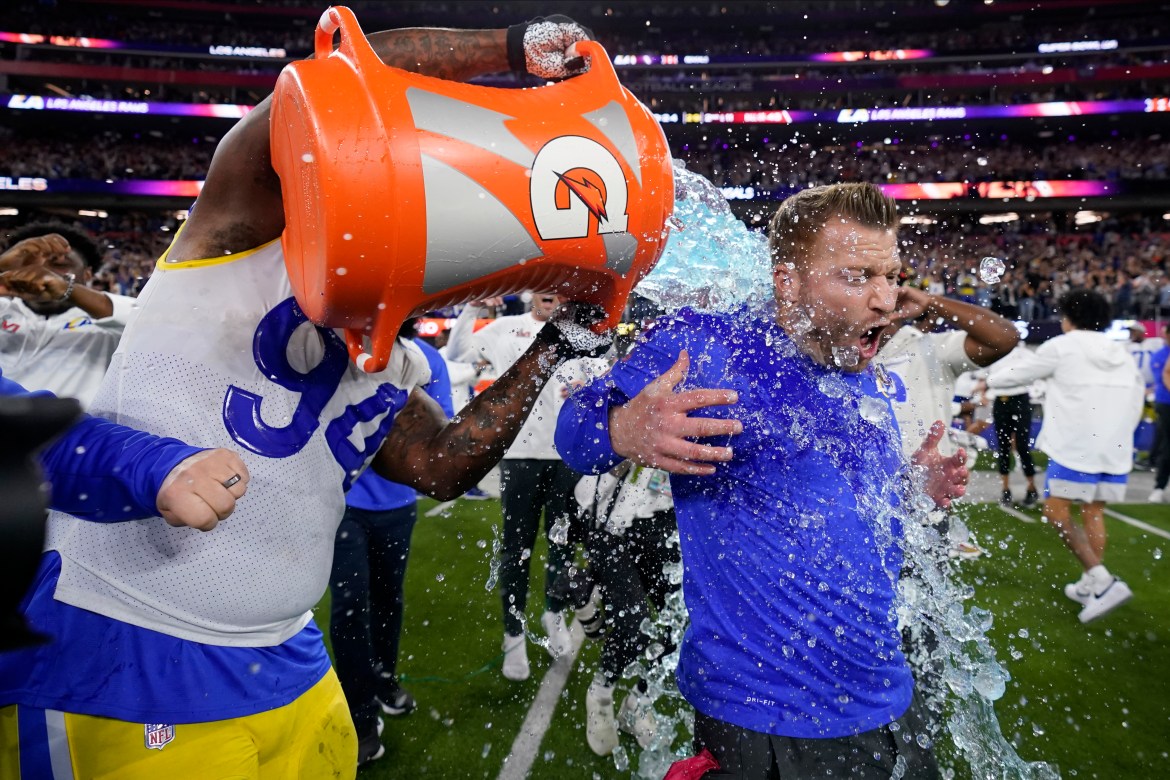 Los Angeles Rams defensive end A'Shawn Robinson, left, pours Gatorade over Los Angeles Rams head coach Sean McVay after the Rams defeated the Cincinnati Bengals