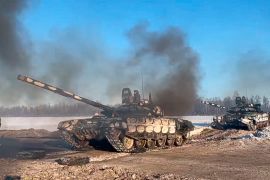 Russian army tanks move back to their permanent base after drills in Russia