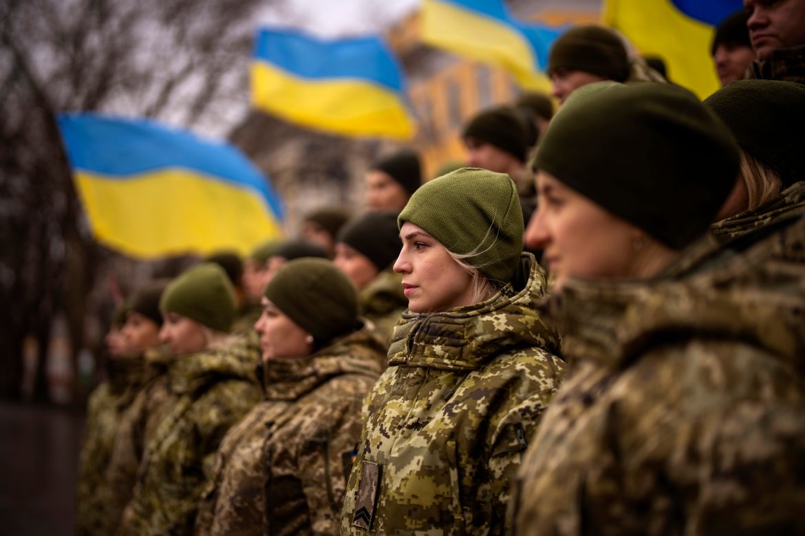 Ukrainian Army soldiers pose for a photo as they gather to celebrate a Day of Unity in Odessa