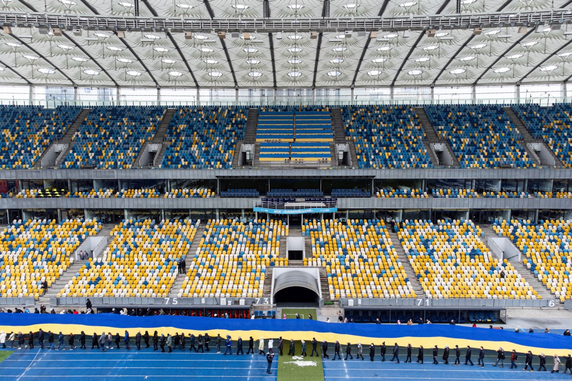 A 200 meter long Ukrainian flag is unfolded at the Olympiyskiy stadium in Kyiv,