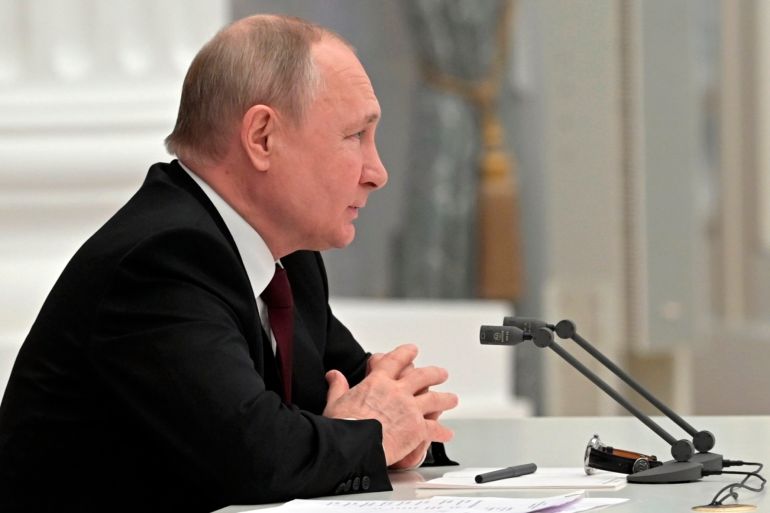 Russian President Vladimir Putin chairs a Security Council meeting in the Kremlin in Moscow