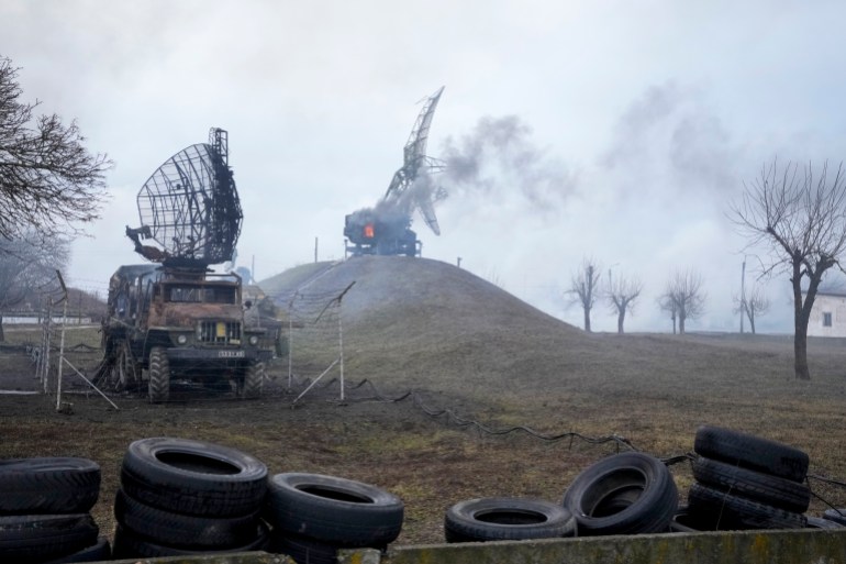 Damaged radar arrays and other equipment is seen at a Ukrainian military facility outside of Mariupol