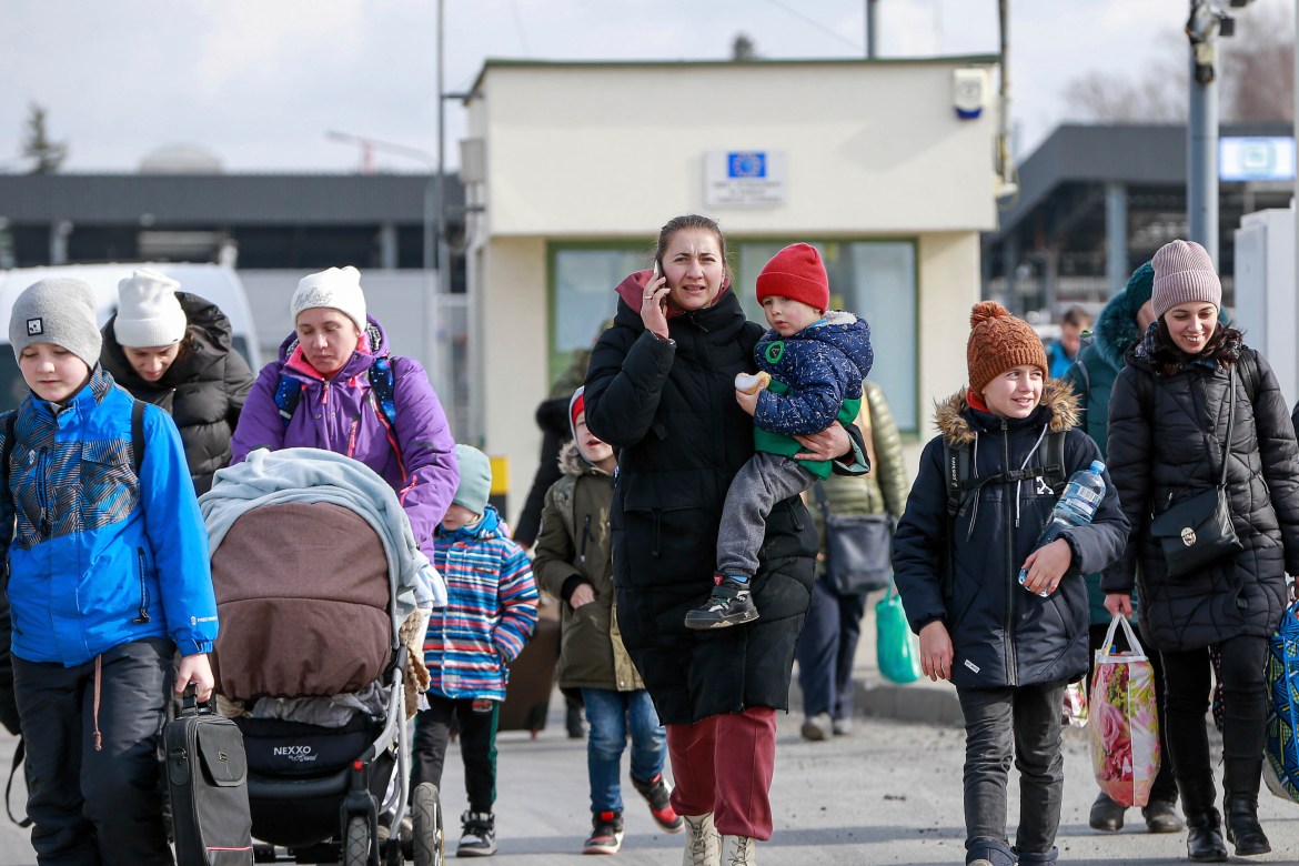 Refugees from Ukraine are seen arriving at the Medyka border crossing in Poland