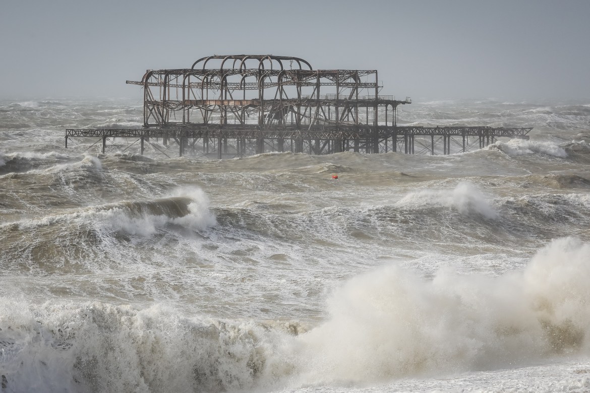 Storm waves surround the remains of The West Pier
