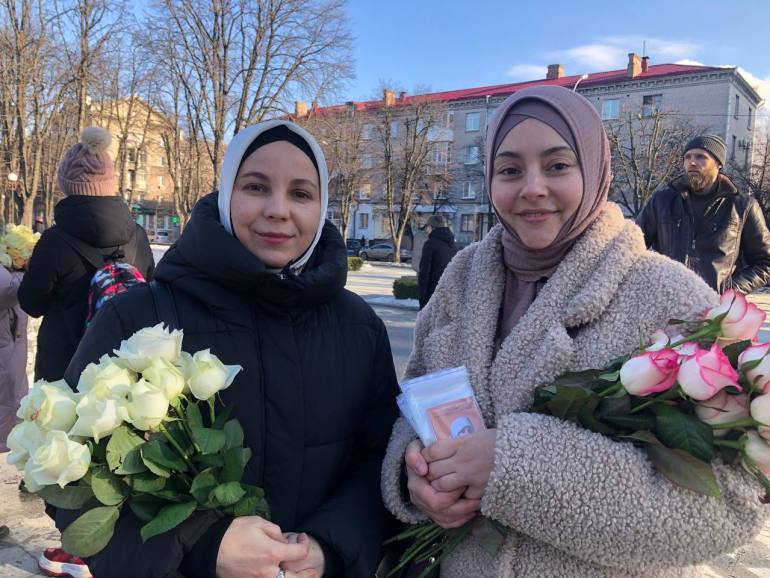 Alime and Kamila celebrate Hijab Day in Kyiv [Nils Adler/Al Jazeera]