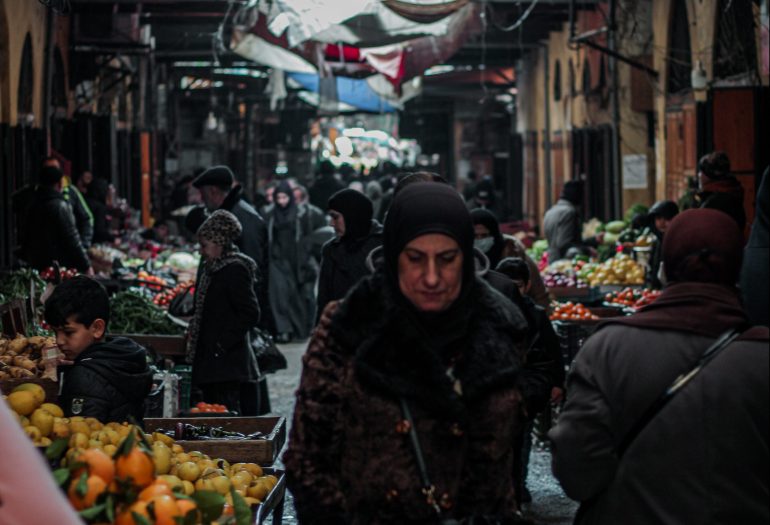 A woman walks through the market in Tripoli, north Lebanon.