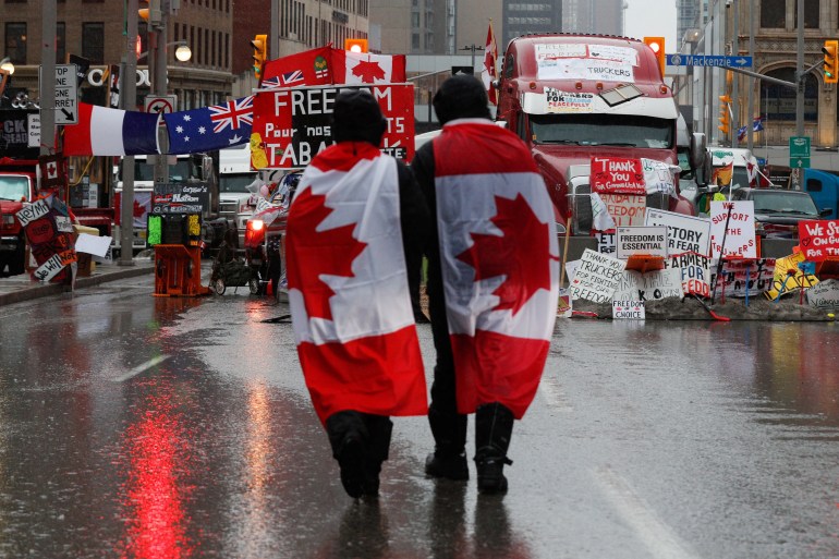 People walk in Ottawa, Ontario, Canada