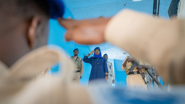 General Zakia Hussen takes a salute from officers while on duty in Somalia