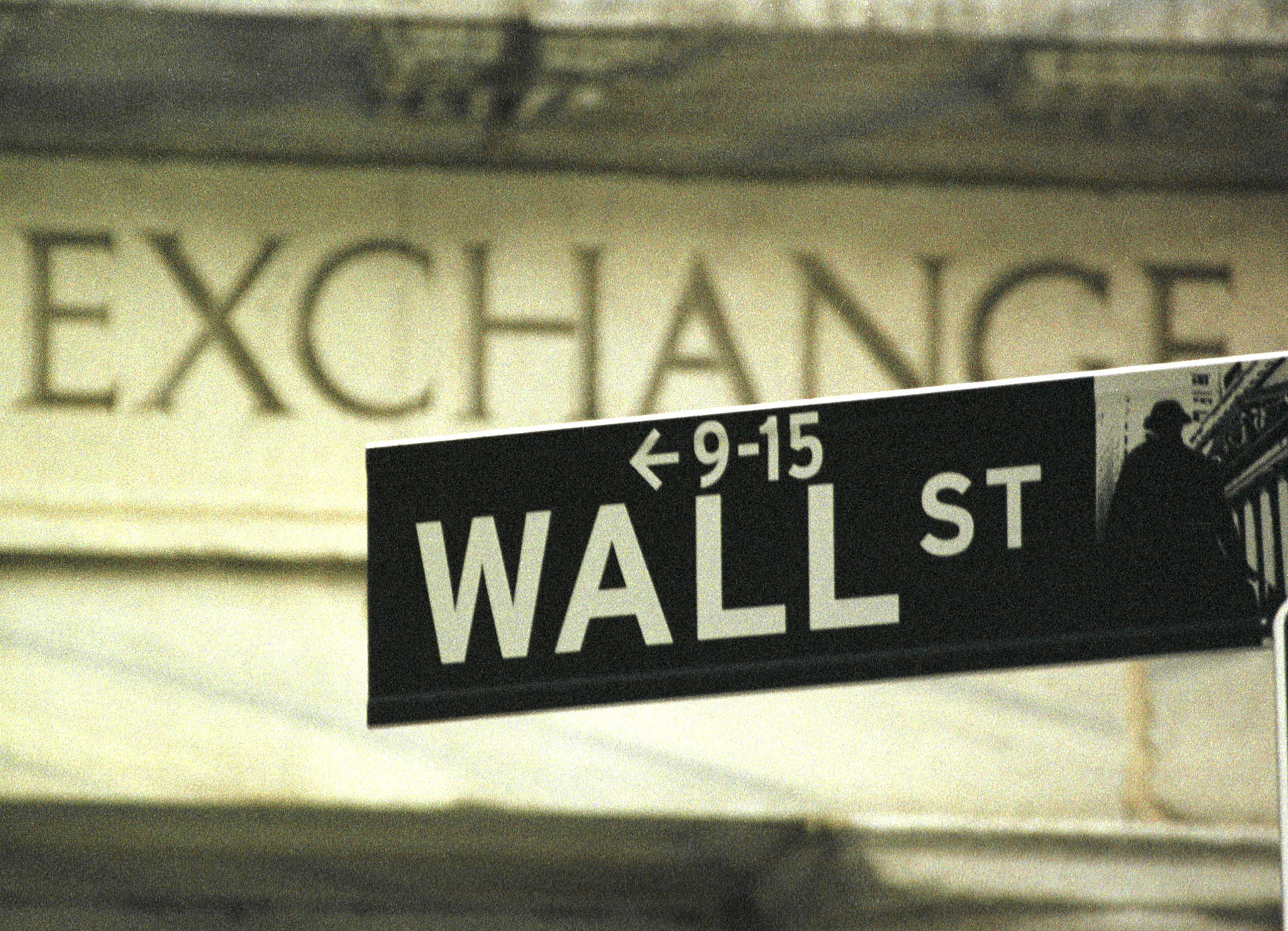 Wall Street closes lower after another session of wild swings