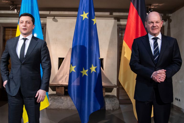 Volodymyr Zelenskyy, president of Ukraine, stands with German Chancellor Olaf Scholz, right, on Saturday