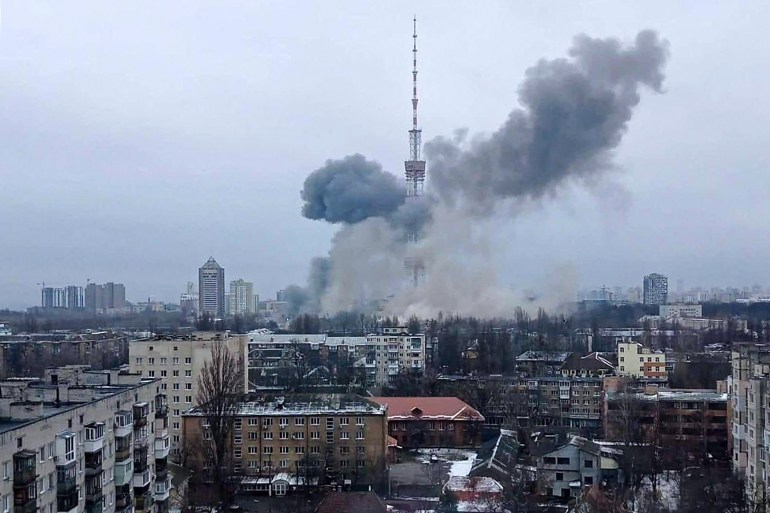 This handout picture released on the Facebook page of the Ukrainian Interior ministry on March 1, 2022 show the smoke after a missile attack targeting the Ukrainian capital's television center in Kyiv