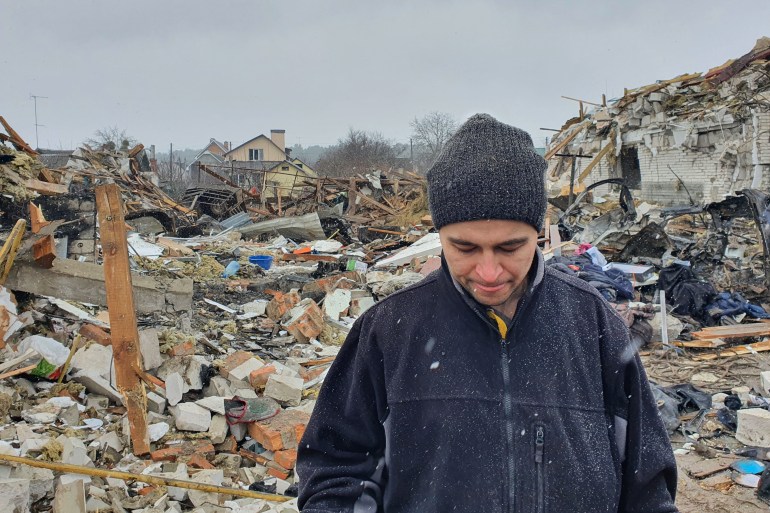 Oleg Rubak, 32, a local engineer who lost his wife Katia, 29, in the shelling, stands on the rubble of his house in Zhytomyr on March 02, 2022, after it was destroyed by a Russian bombing the day before. - The shelling killed at least 3 people and injured nearly 20 according to locals and local authorities, destroyed a local market and at least 10 houses on March 01, 2022.