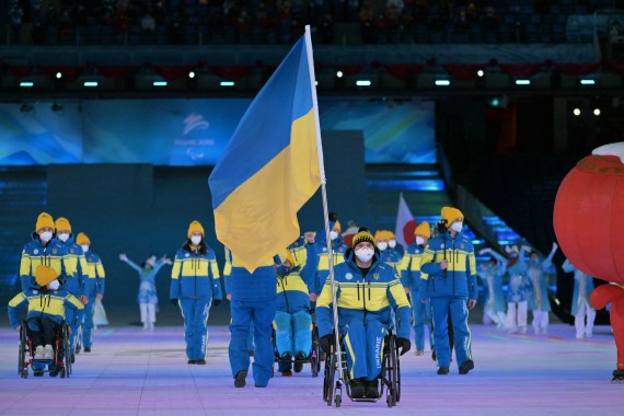 Ukrainian flagbearer at paralympics opening.