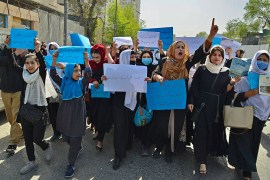 Afghan women and girls take part in a protest in front of the Ministry of Education in Kabul