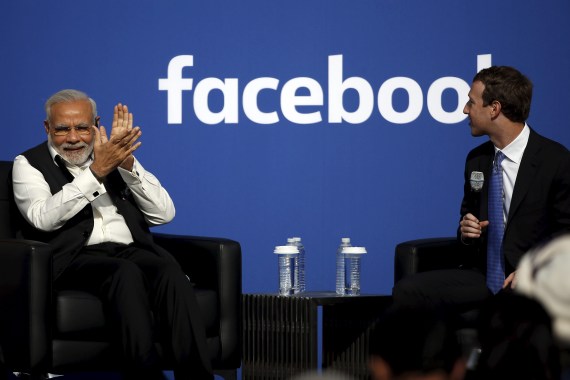 Indian prime minister Narendra Modi applauds as Facebook CEO Mark Zuckerberg speak in California, US