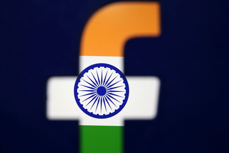 India's flag is seen through a 3D printed Facebook logo
