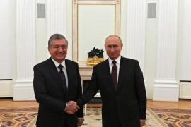 Russia's President Vladimir Putin shakes hands with Uzbekistan's President Shavkat Mirziyoyev during a meeting in Moscow, Russia June 23, 2020. Sputnik/Alexei Nikolsky/Kremlin via REUTERS ATTENTION EDITORS - THIS IMAGE WAS PROVIDED BY A THIRD PARTY.