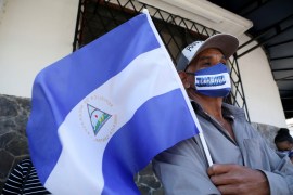 Man carrying Nicaraguan flag