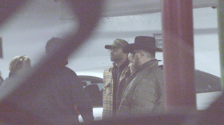 Enrique Tarrio, Chairman of the Proud Boys, and Stewart Rhodes, founder of the Oath Keepers, attend a meeting in a garage in Washington, U.S. in a still image taken from video January 5, the day before the Capitol riot.