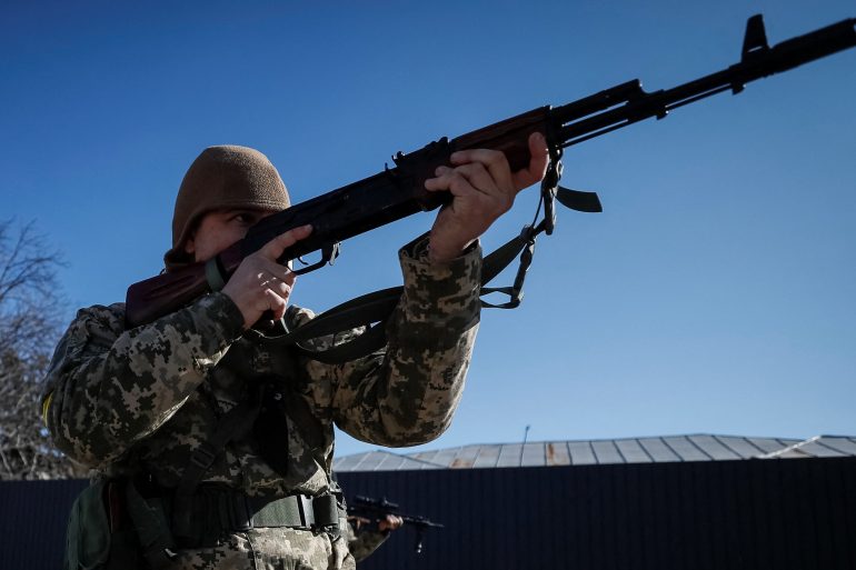 New members of the Ukrainian Territorial Defence Forces train with newly received weapons
