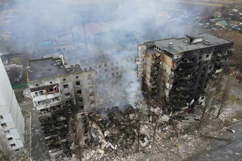An aerial view shows a residential building destroyed by shelling in the Kyiv region