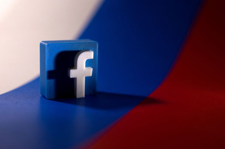 Facebook logo is placed on a Russian flag in this illustration picture