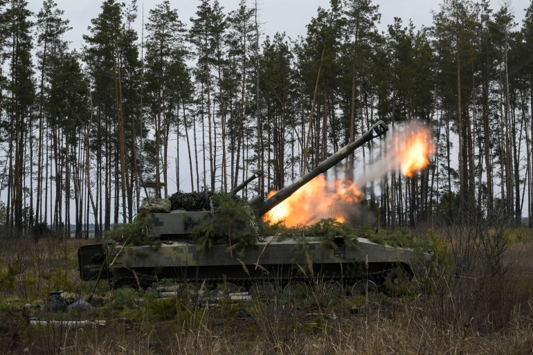Ukrainian armed forces self-propelled howitzers fire at positions following Russia's invasion of Ukraine