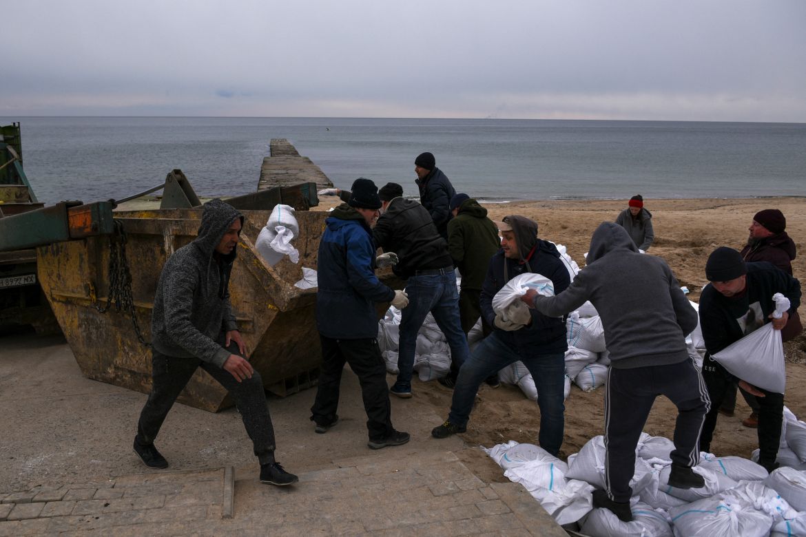 Volunteers fill sandbags, during Russia's invasion of Ukraine, on a beach in the city of Odessa