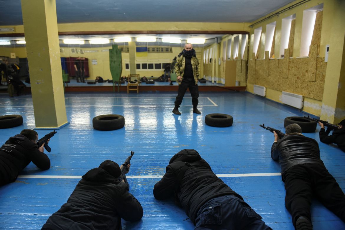 Civilians who volunteered to join the Territorial Defense Forces train on weapons, following Russia's invasion of Ukraine, in Odessa