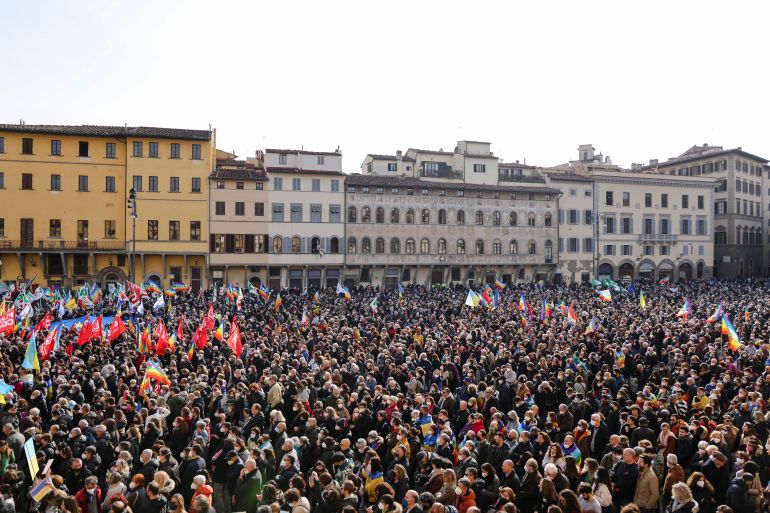 Demonstrators gather in Santa Croce square to protest against the Russian invasion of Ukraine, in Florence, Italy, March 12, 2022. 