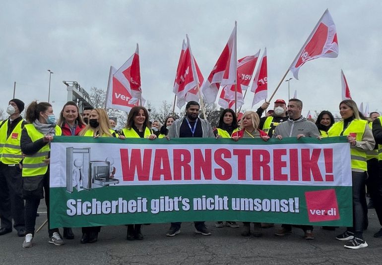 Security staff of Germany's mighty public sector union ver.di gather in front of Frankfurt's International Airport