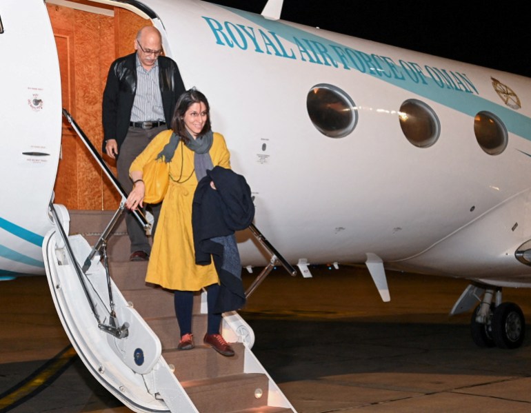 British-Iranians Nazanin Zaghari-Ratcliffe and Anoosheh Ashoori step off a plane in Oman on their way back home to the UK after years in captivity in Iran