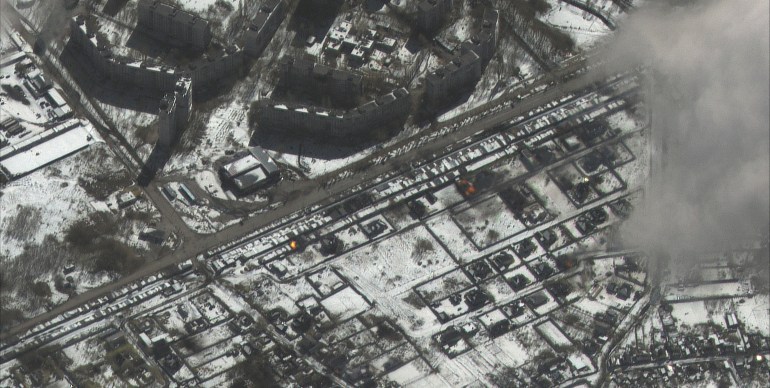 A satellite image shows fires and damage in a residential area, in Kharkiv, Ukraine, March 16, 2022.