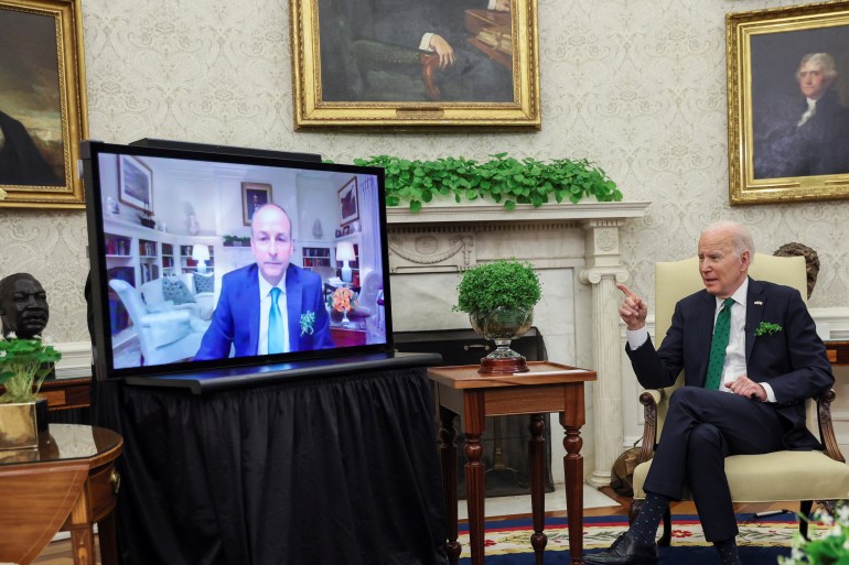 U.S. President Joe Biden speaks while hosting a virtual St. Patrick's Day meeting with Ireland's Prime Minister Micheal Martin after Irish Taoiseach Martin tested positive for coronavirus disease (COVID-19) after arriving in Washington.