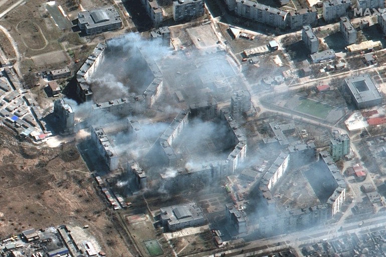 A satellite image shows burning apartment buildings in Mariupol, Ukraine, March 19, 2022.