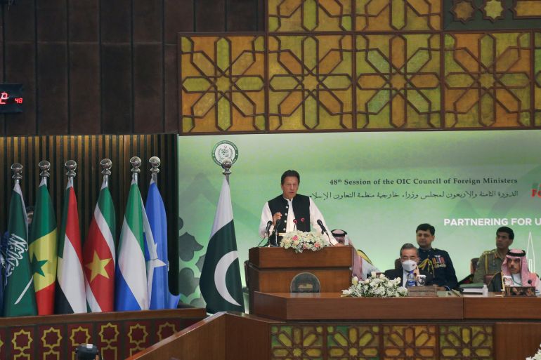 Pakistan’s Prime Minister Imran Khan gives the keynote speech at the 48th meeting of the Organisation of Islamic Cooperation