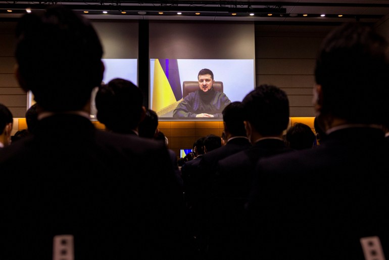 Ukraine's president is seen addressing Japan's lower house of parliament