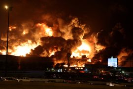 Flames and smoke billow from the Saudi Aramco fuel depot in Jeddah after a Houthi attack