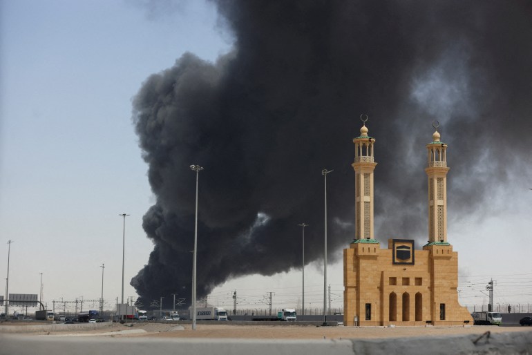 Black smoke billows from an oil storage facility in Jeddah that was attacked by the Houthis