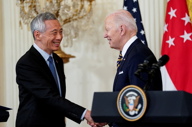 US President Biden greets Singapore PM Lee