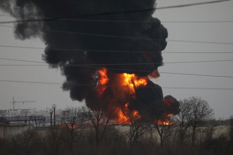 A fire is seen at a fuel depot in Russia's western city of Belgorod