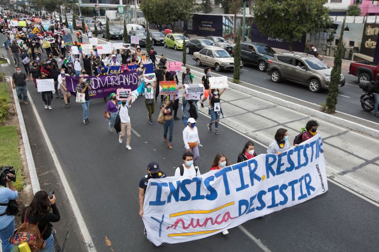 Protesters march in Guatemala City against a strict anti-abortion law