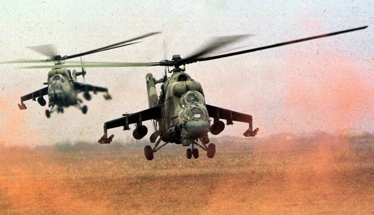 Russian Mi-24 helicopter gunships flying