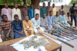A group of men identified by Nigerian police as Boko Haram extremist fighters and leaders are shown to the media