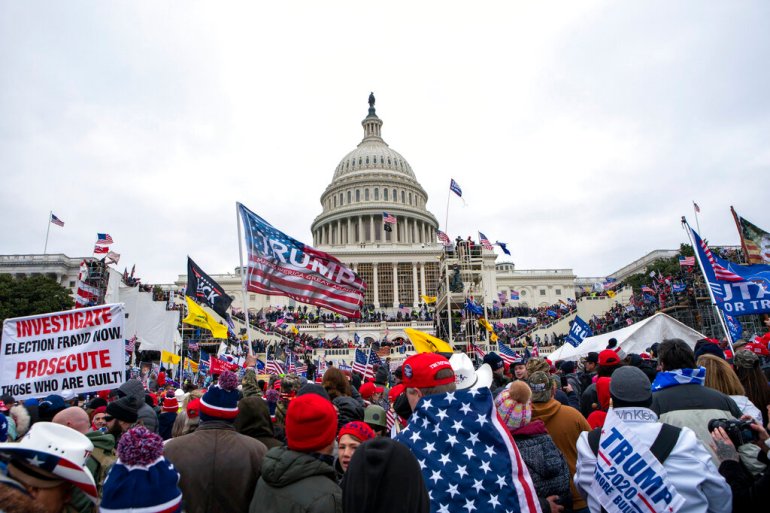 Thousands of people loyal to President Donald Trump swarmed the US Capitol, where police officers were attacked and beaten by the mob.