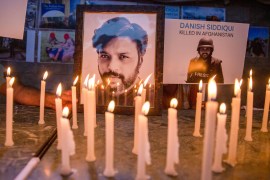 Journalists in New Delhi, India, light candles and pay tribute to Reuters photographer Danish Siddiqui