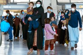 Afghan families arrive at airport in US