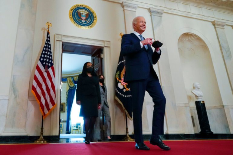 President Joe Biden, right, arrives with Vice President Kamala Harris and Judge Ketanji Brown Jackson, left, to announce Judge Ketanji Brown Jackson as his nominee to be an Associate Justice of the US Supreme Court at the White House.