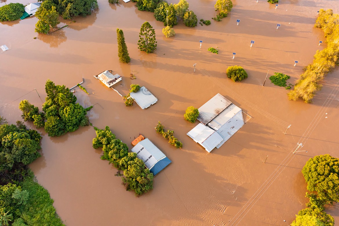 water floods streets and houses in Maryborough, Australia