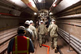 Navy and civilian water quality recovery experts through the tunnels of the Red Hill Bulk Fuel Storage Facility, near Pearl Harbor, Hawaii.
